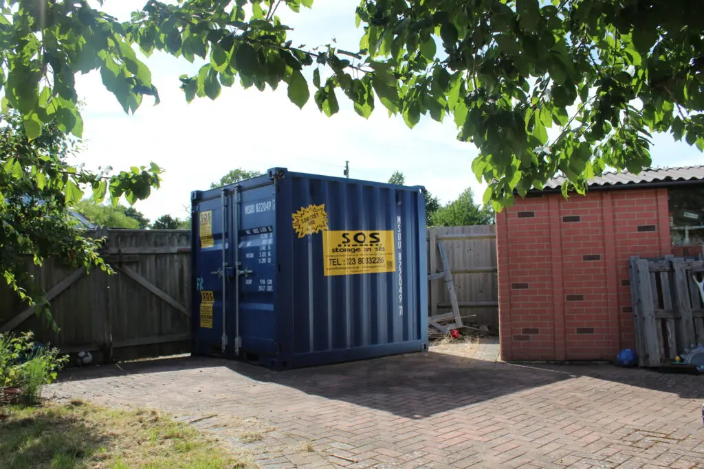 8ft furniture grade container in a garden in Blackfield