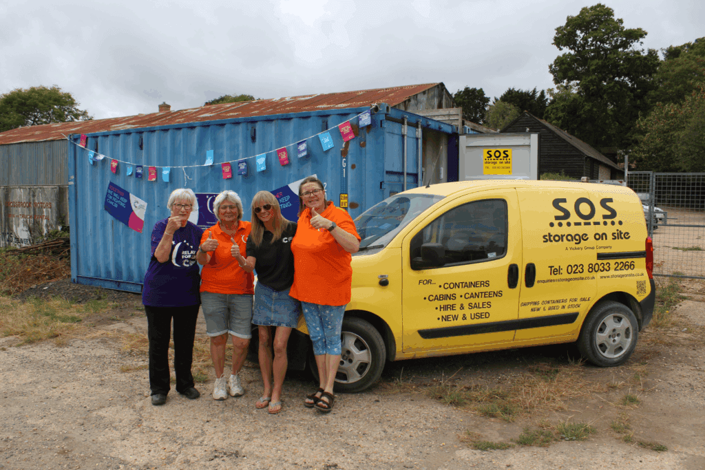Portsmouth Relay For Life Committee Members with Storage on Site Shipping Container