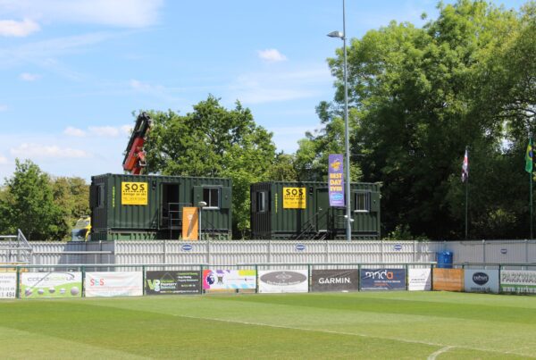 Pitchside View of Double Stacked Cabin and Container at AFC Totton | Storage on Site