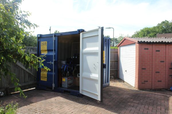 8ft furniture grade container in a garden in Blackfield