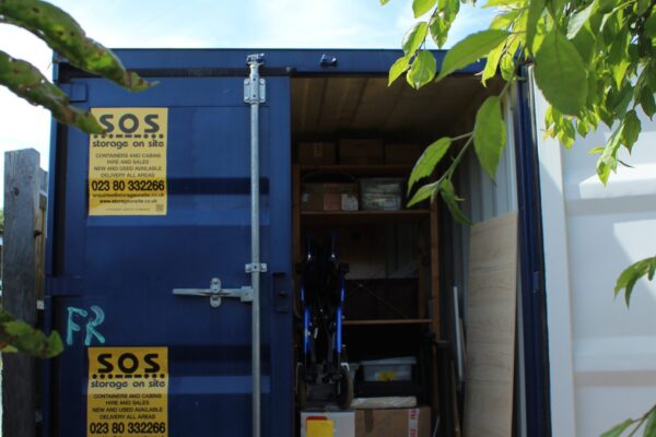 8ft furniture grade container in a garden in Blackfield